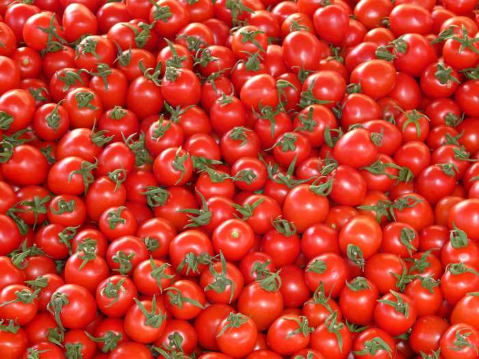 Pile of fresh red tomatoes