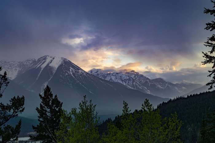 Snow-capped mountains at sunset in Banff, Canada