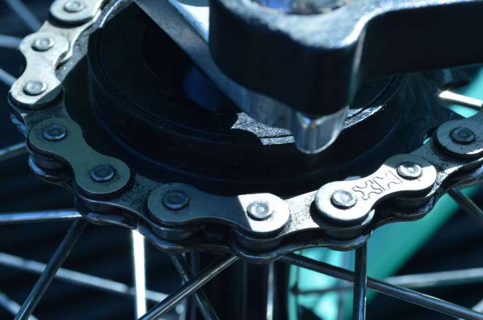 Close-up of a bicycle chain and gear
