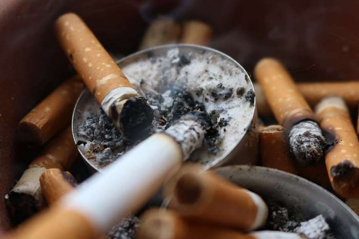 Cigarettes in an Ashtray with Ashes