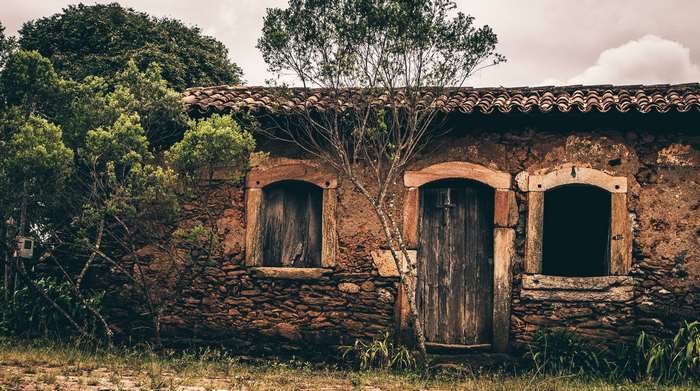 Historic stone house with wooden doors and windows in Minas Gerais, Brazil 4K