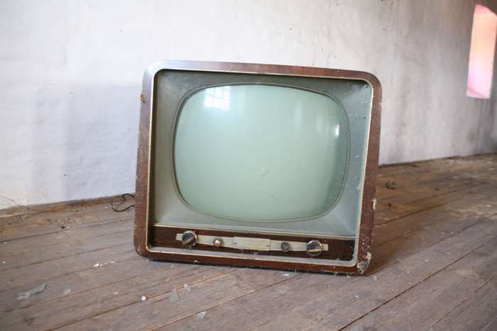 Vintage television in an abandoned room