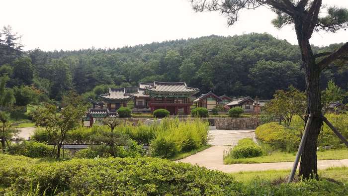Traditional Korean architecture in a park setting