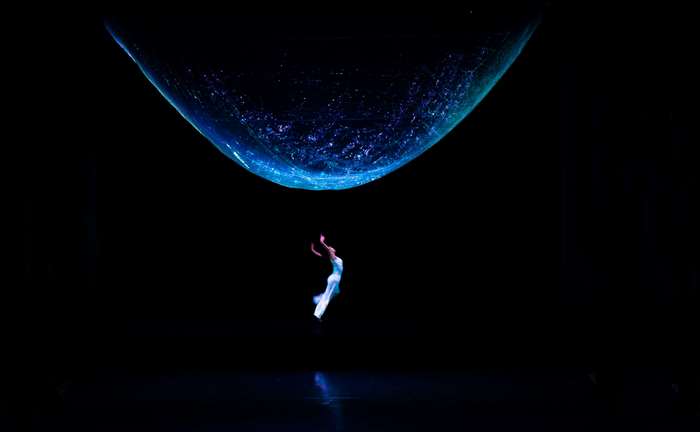 Dancer under a glowing blue net 4K