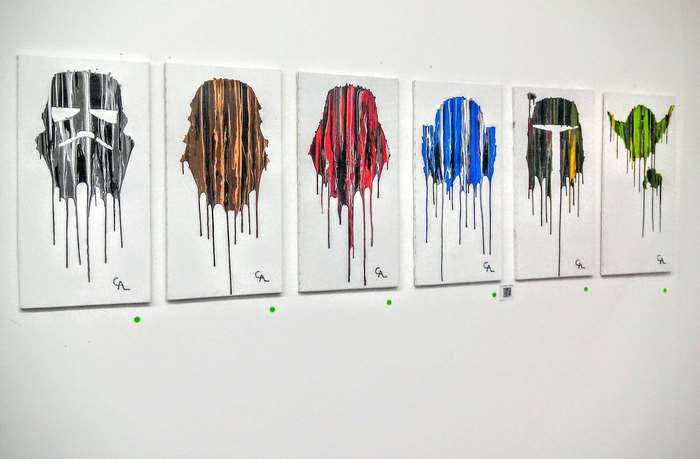 Star Wars characters drip paintings on white canvases