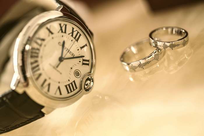 Cartier watch and wedding rings
