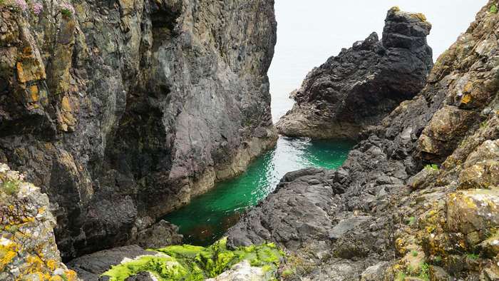 Rocky coast with emerald green water