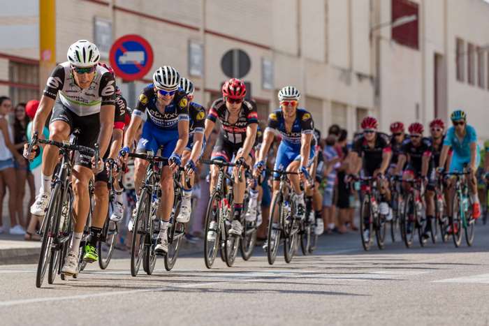 Cyclists racing on a city street