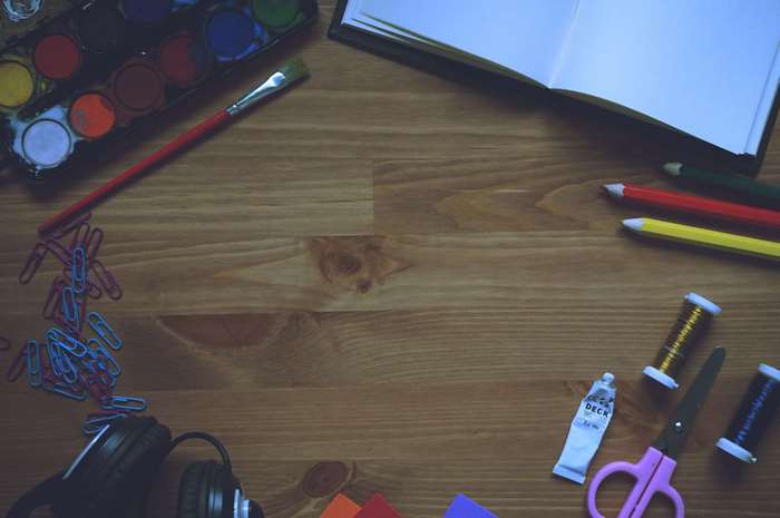 Art supplies on a wooden table