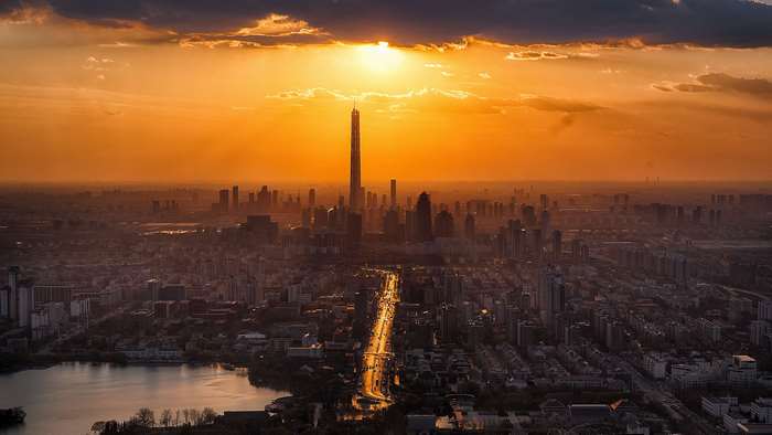 Cityscape with skyscrapers at sunset
