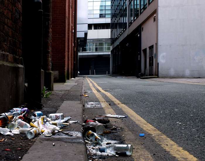 Trash in a Manchester alleyway