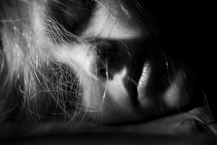 Black and white portrait of a young woman's face