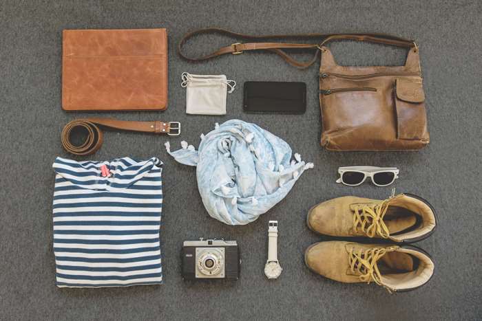 Flat lay of vintage travel accessories