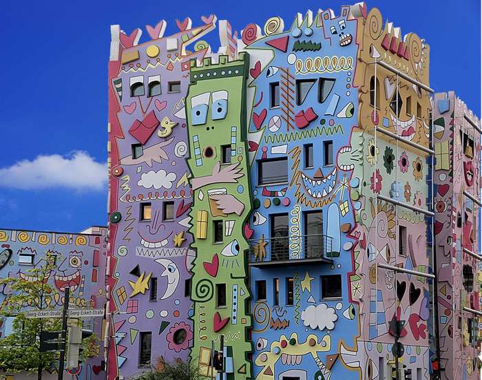 Colorful apartment building with cartoonish decorations