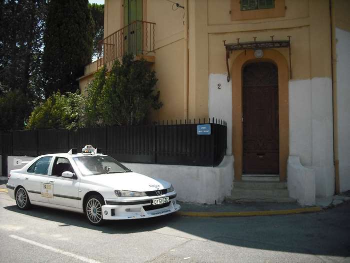 White Peugeot 406 taxi in Marseille