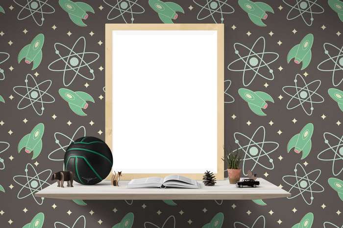 Shelf with toys and picture frame on rocket wallpaper