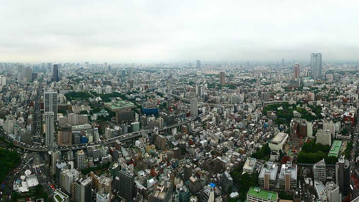 Aerial view of Tokyo cityscape with dense buildings and highways