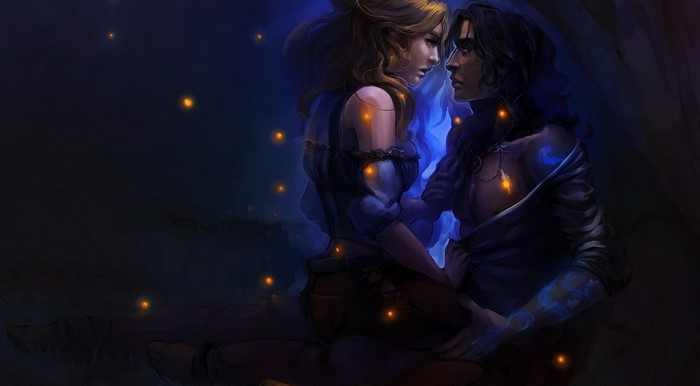 Couple in the night with glowing lights