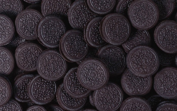 Oreo cookies stacked closely together
