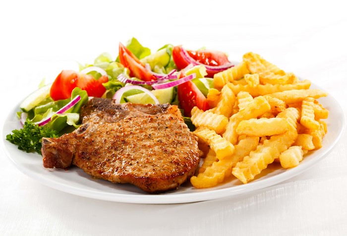 Grilled Pork Chop with Fries and Fresh Salad