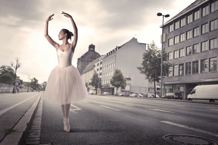 Ballerina dancing on a city street
