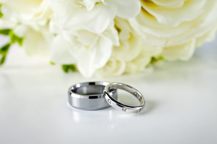 Silver Wedding Rings with White Flowers