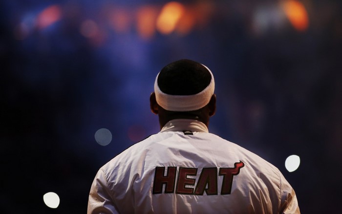 LeBron James wearing a Miami Heat jacket
