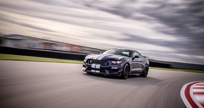 Blue Ford Mustang Shelby GT350 on a Racetrack