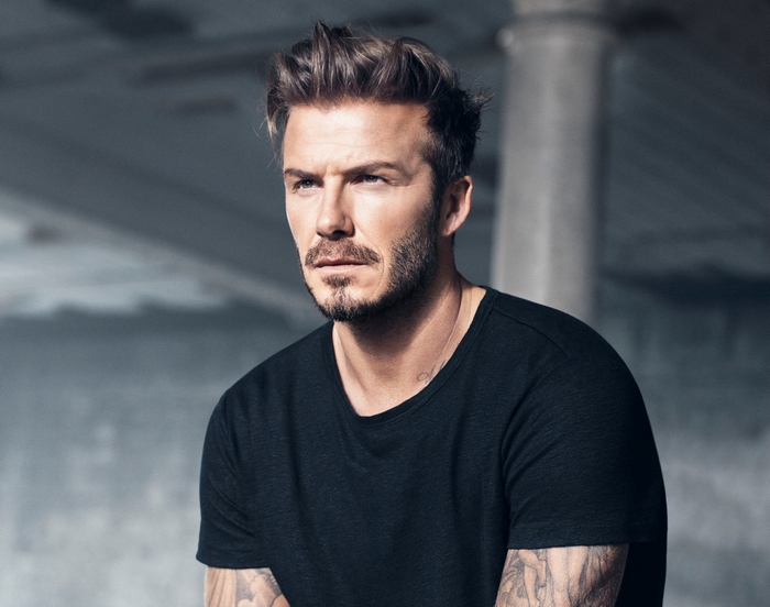 David Beckham wearing a black t-shirt
