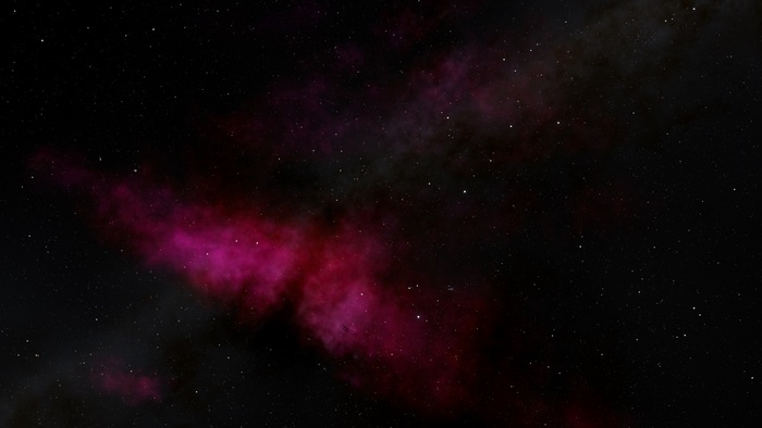 Pink and purple nebula in a dark starry sky