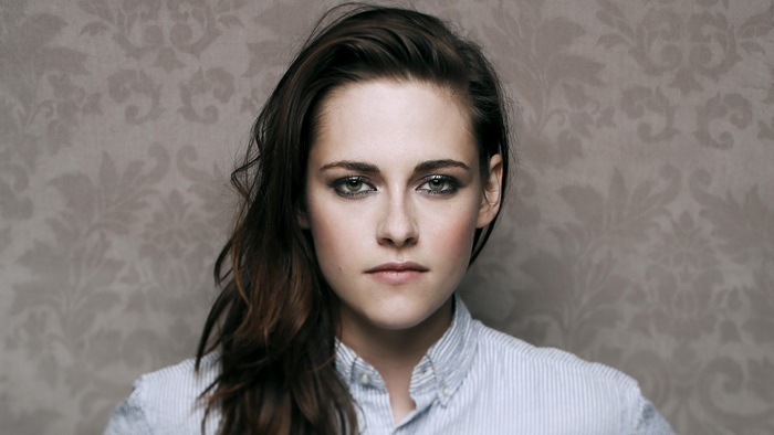 Kristen Stewart wearing a striped shirt