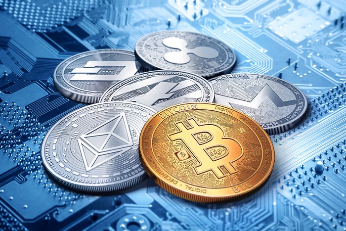 Bitcoin and other cryptocurrencies on a circuit board