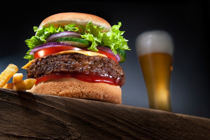 Burger with fries and beer