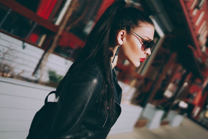 Woman with Black Hair and Sunglasses