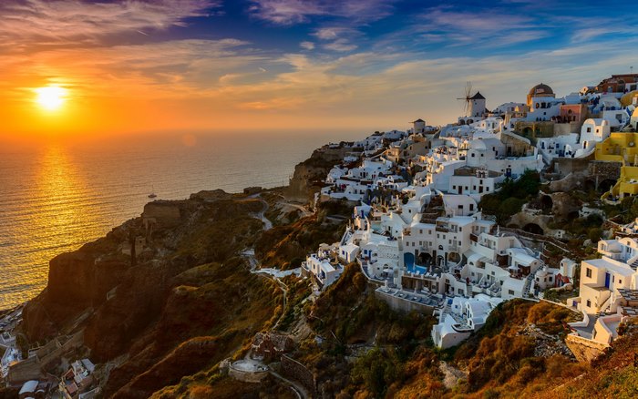 Santorini town at sunset over the ocean