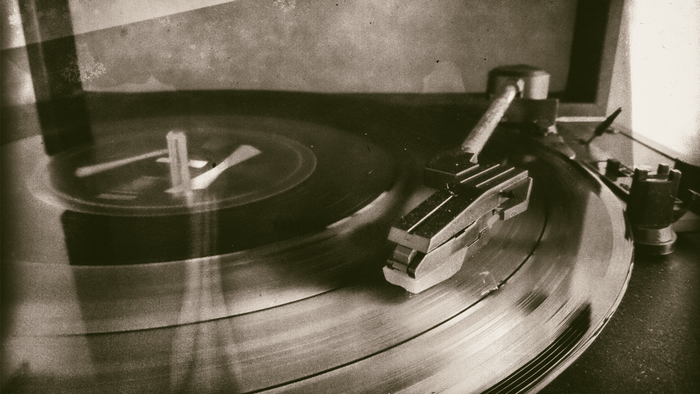Vintage record player with vinyl record