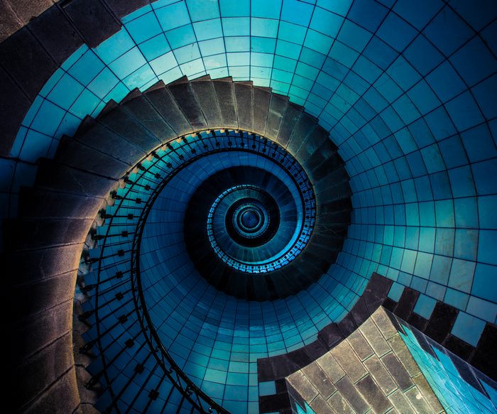 Spiral Staircase with Blue Tiled Walls