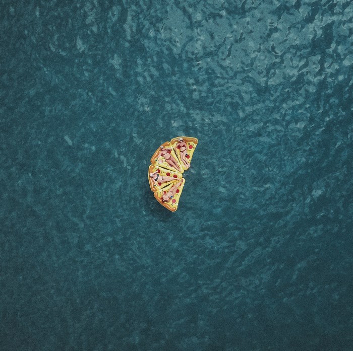 Pizza floaty on the ocean