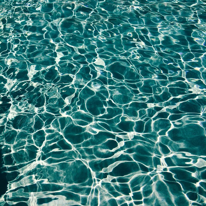 Water surface with light reflections