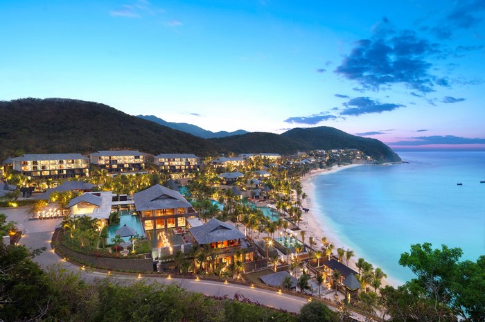 Luxury resort on a tropical beach at dusk