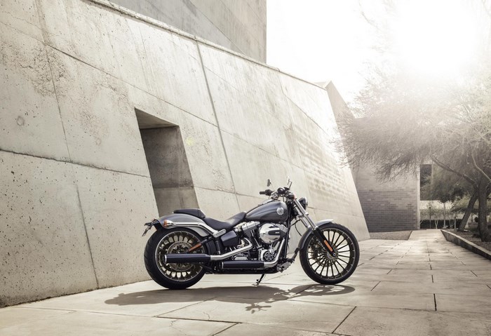 Harley Davidson Breakout motorcycle parked by concrete building