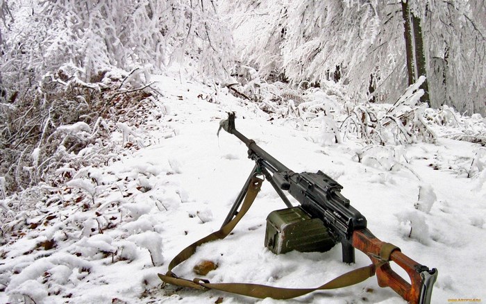 PKM machine gun in a snowy forest