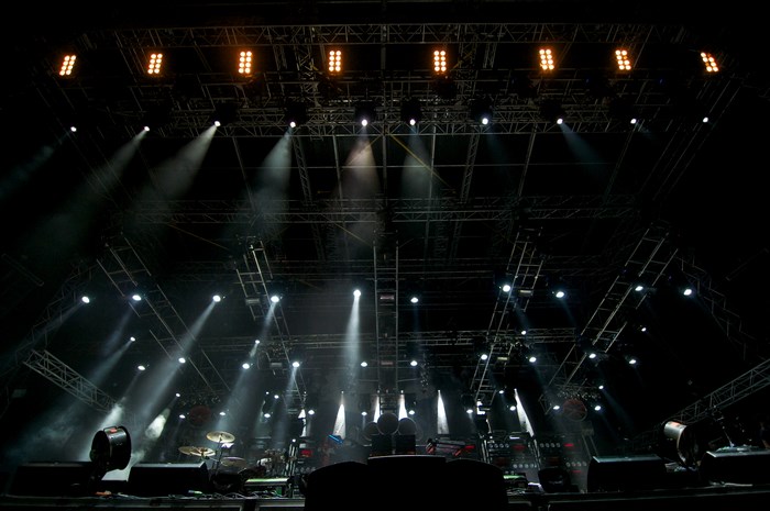 Concert stage with spotlights and equipment
