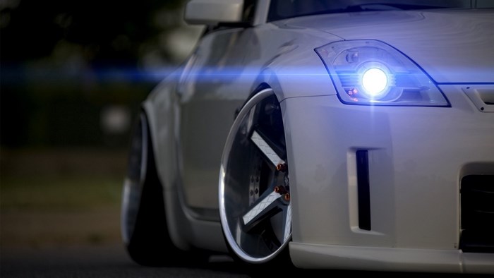 Nissan 350Z with custom rims and headlights