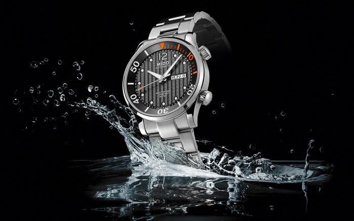 Mido Multifort Chronometer watch splashing in water