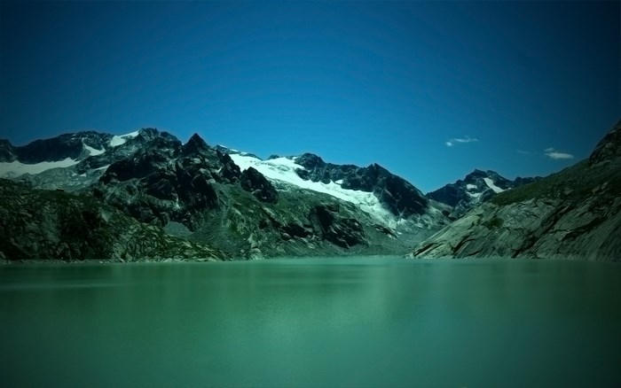 Lake and mountains with snow