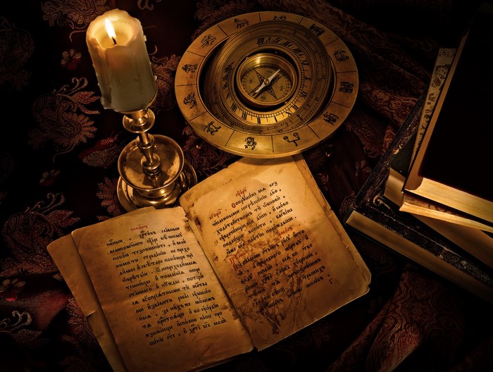 Candle, Compass, and Old Books