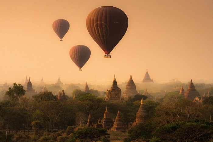 Hot air balloons over Bagan temples at sunrise