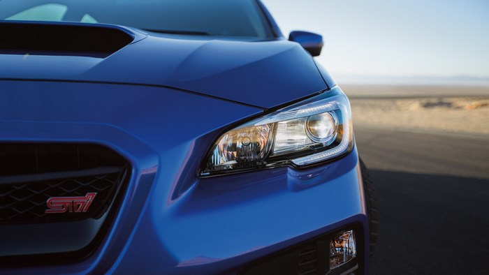 Blue Subaru WRX STI front grille and headlight
