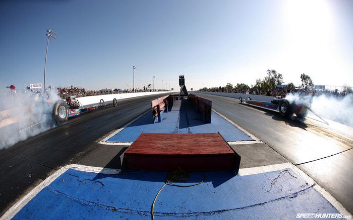 Drag Racing Cars Launching with Smoke